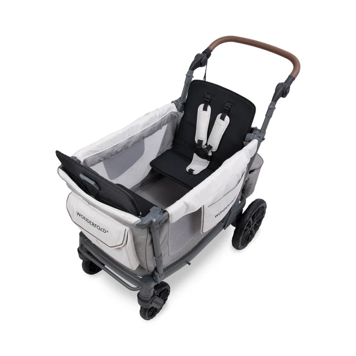 Wonderfold L2 Double Stroller Wagon in Grey with seats folded, a compact toddler stroller solution.