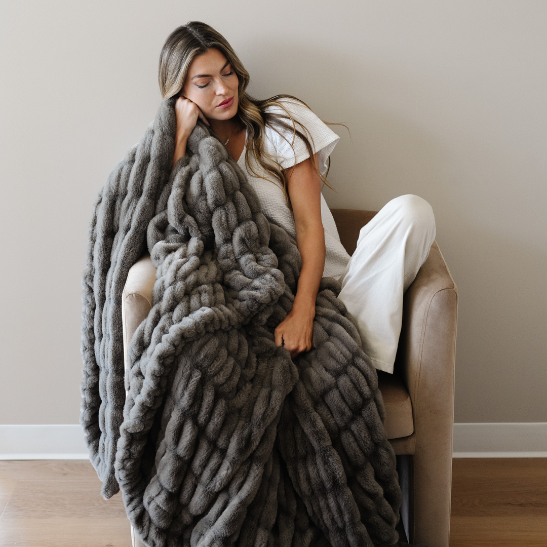 Relax more with the Saranoni Double Ruched Faux Throw Blanket in Cobblestone Ñ a cozy, premium faux fur Throw Blanket must-have.
