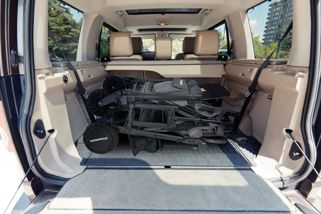 Lifestyle image of Wonderfold Wheel Covers with W4 series, keeping wagon stroller wheels clean and stylish.