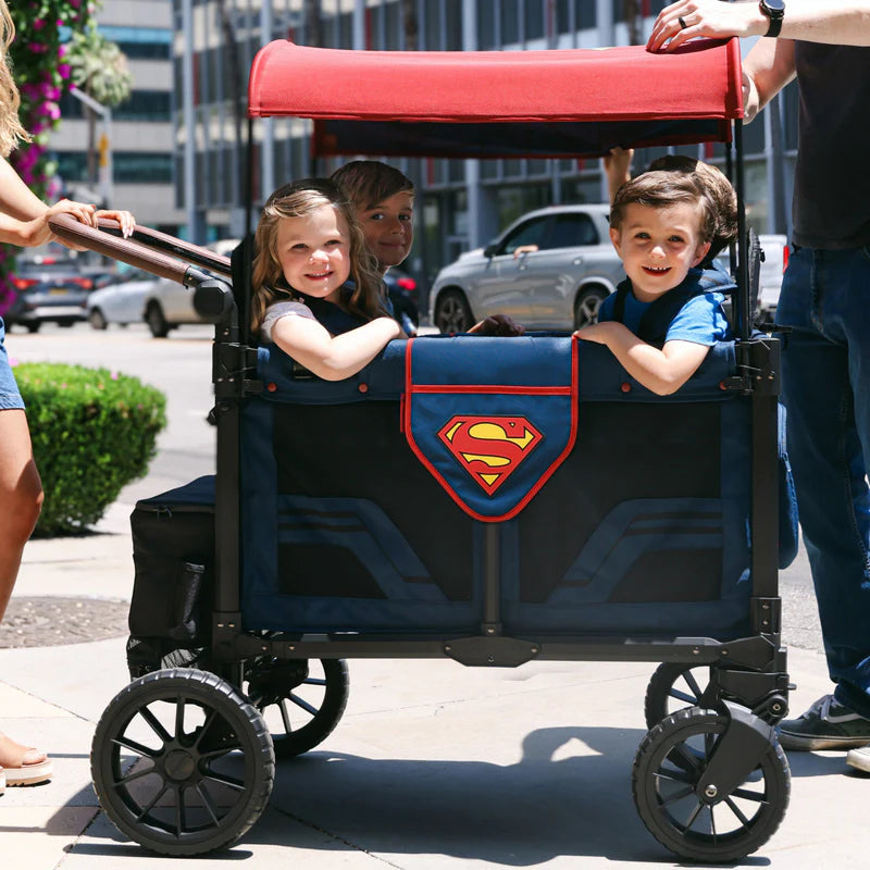 Family outing scene with Superman Wonderfold W4 Elite Pro Stroller Wagon, ideal stroller wagon accessories setup