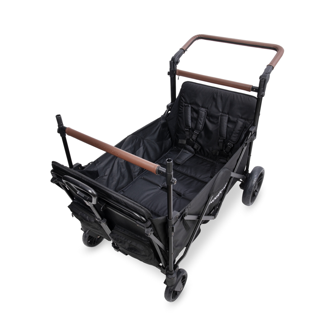 Wonderfold X4R Quad Stroller Wagon Black side view showing storage pockets and 5-point harnesses