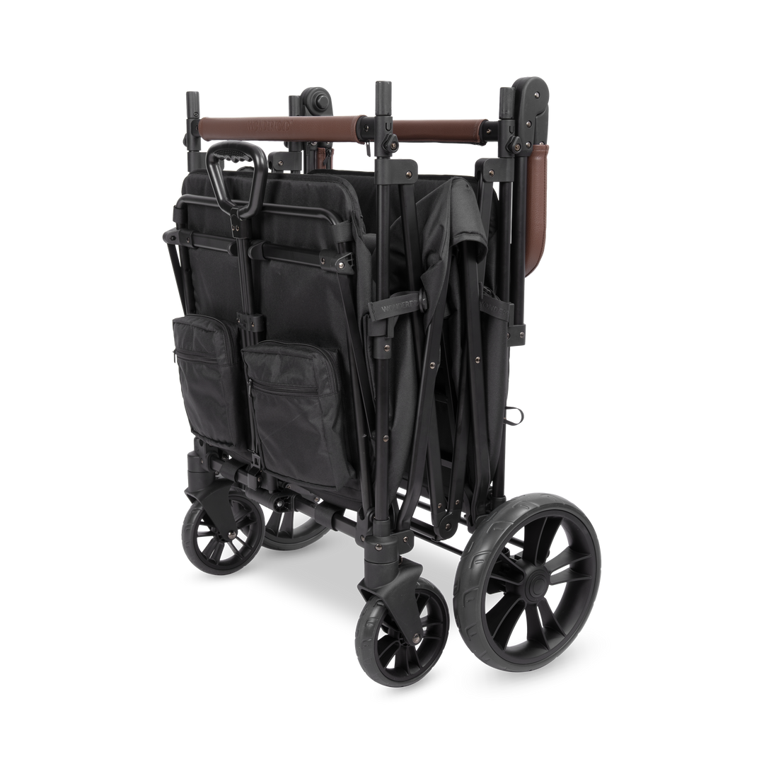 Folding stroller wagon: Wonderfold X4R Quad Stroller Wagon Black stands upright when folded
