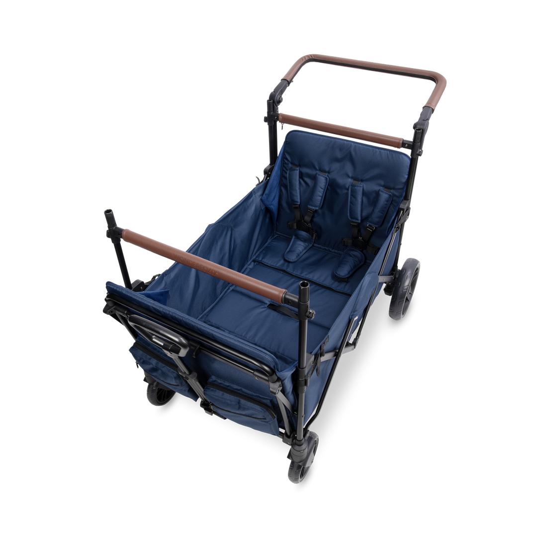 Side view of the Navy Wonderfold X4R Quad Stroller Wagon, a family wagon stroller for four kids
