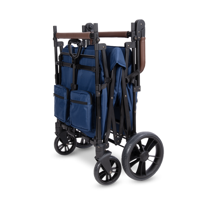 Wonderfold X4R Quad Stroller Wagon Navy folded flat for trunk storage, a compact quad wagon