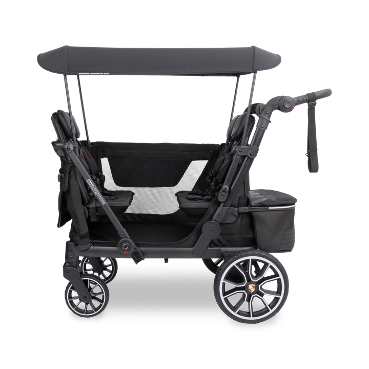 Bench seats with 5-point harnesses inside the WonderFold x Porsche L4 Quad Stroller Wagon