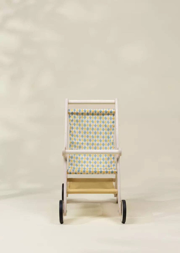 Front facing Wooden Dolls' Stroller from Coco Village featuring a woven diamond pattern seat