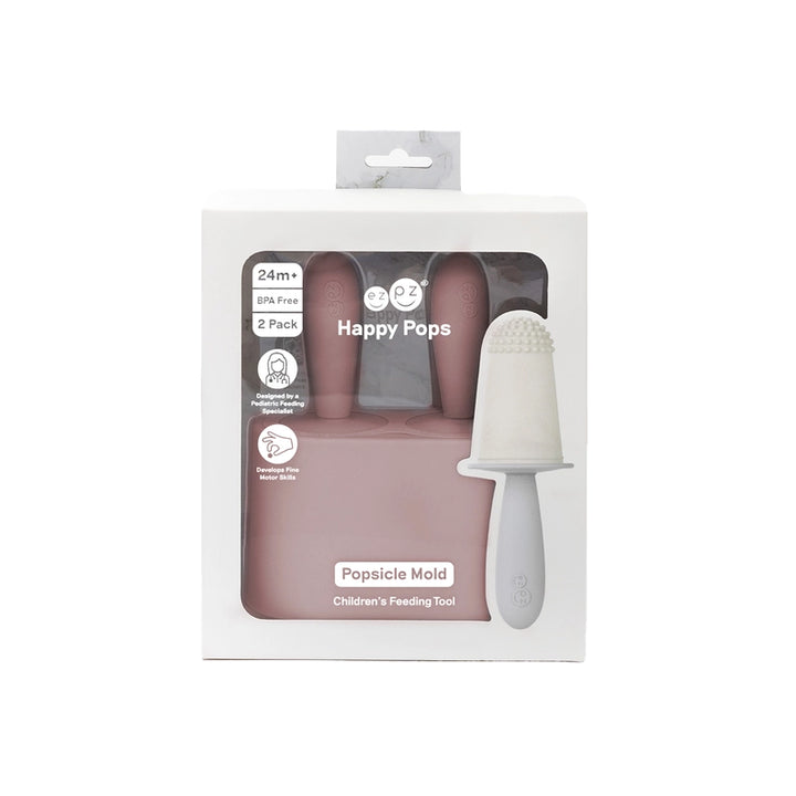 Available in multiple colors, EZPZ Happy Pops in Blush is a versatile baby silicone feeding set that grows with your child