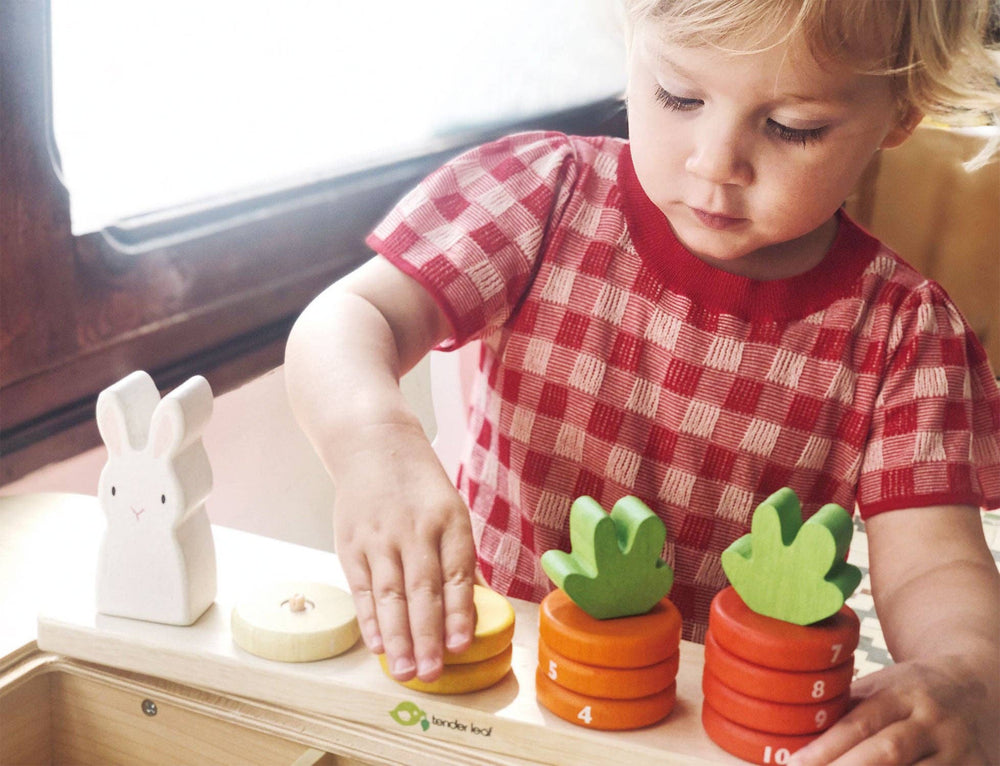Encourage hands-on learning with the Tenderleaf Toys Counting Carrots, a Montessori toy for toddlers.