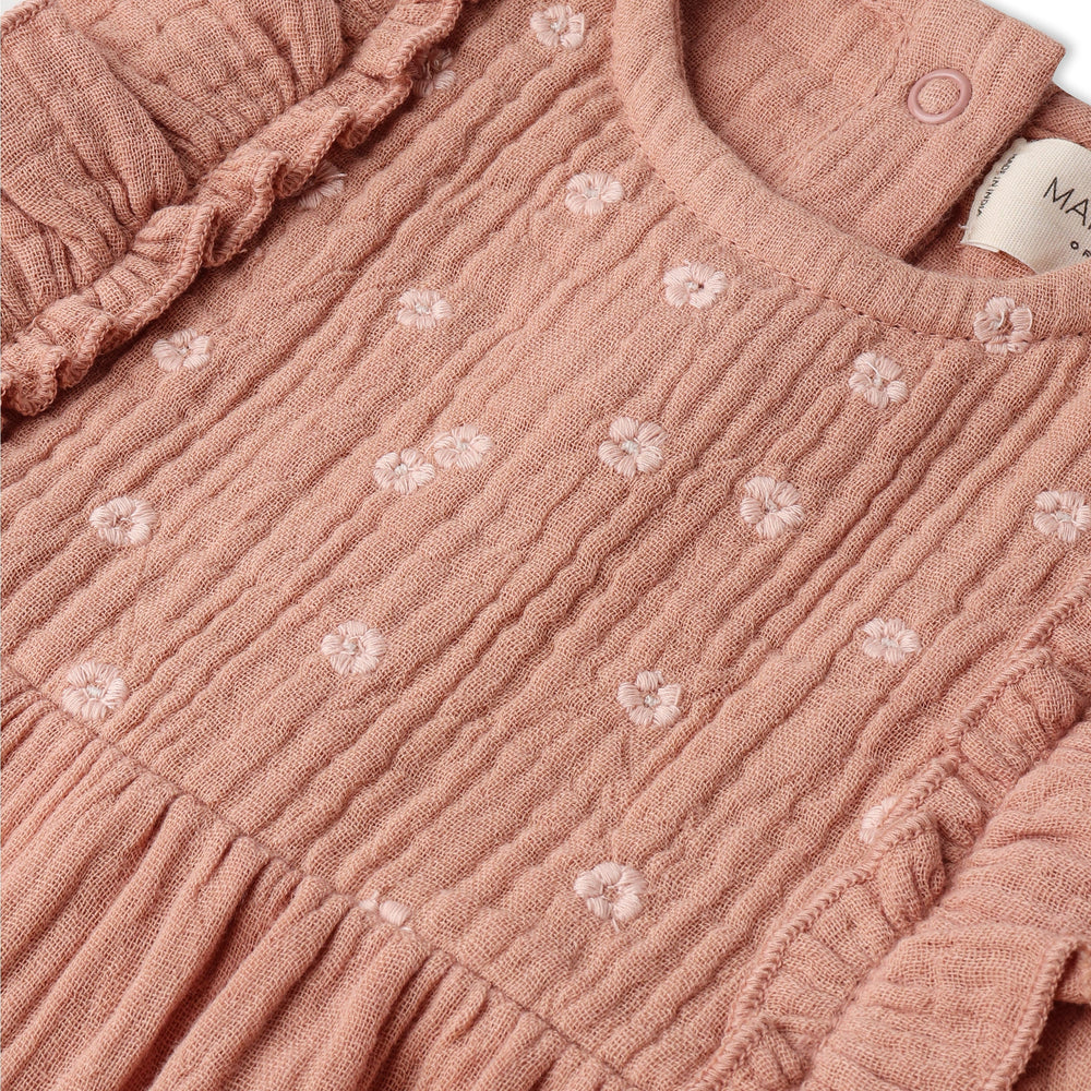 MakeMake Organics Embroidered Ruffle Romper Clay lifestyle - unique organic artisan baby one-piece