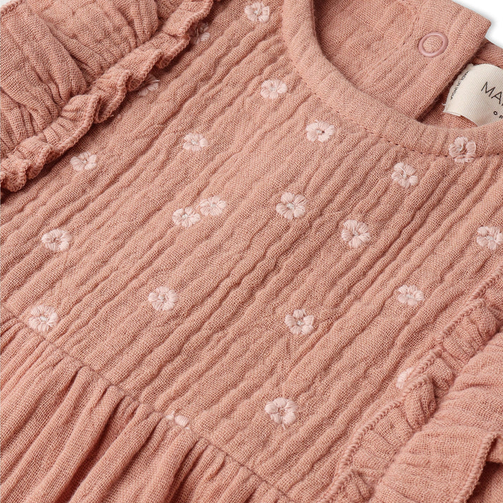MakeMake Organics Embroidered Ruffle Romper Clay lifestyle - unique organic artisan baby one-piece