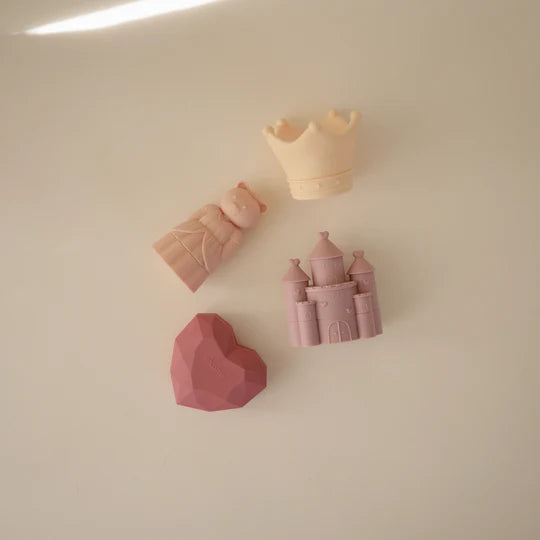 pink, purple, and yellow mushi princess infant bathing toys 