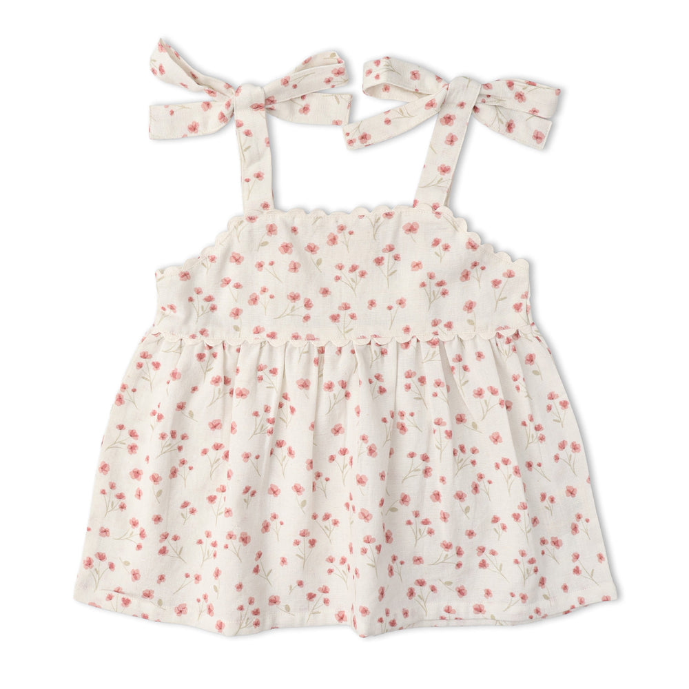 MakeMake Organics Pink Bloom Tie Up Set lifestyle - cheerful organic cotton toddler summer outfit