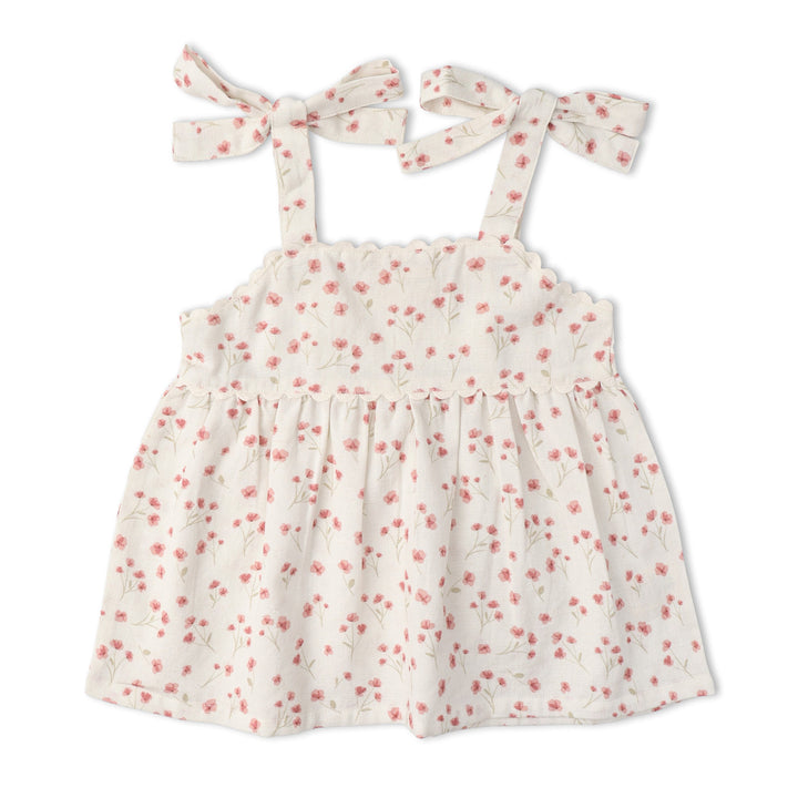 MakeMake Organics Pink Bloom Tie Up Set lifestyle - cheerful organic cotton toddler summer outfit