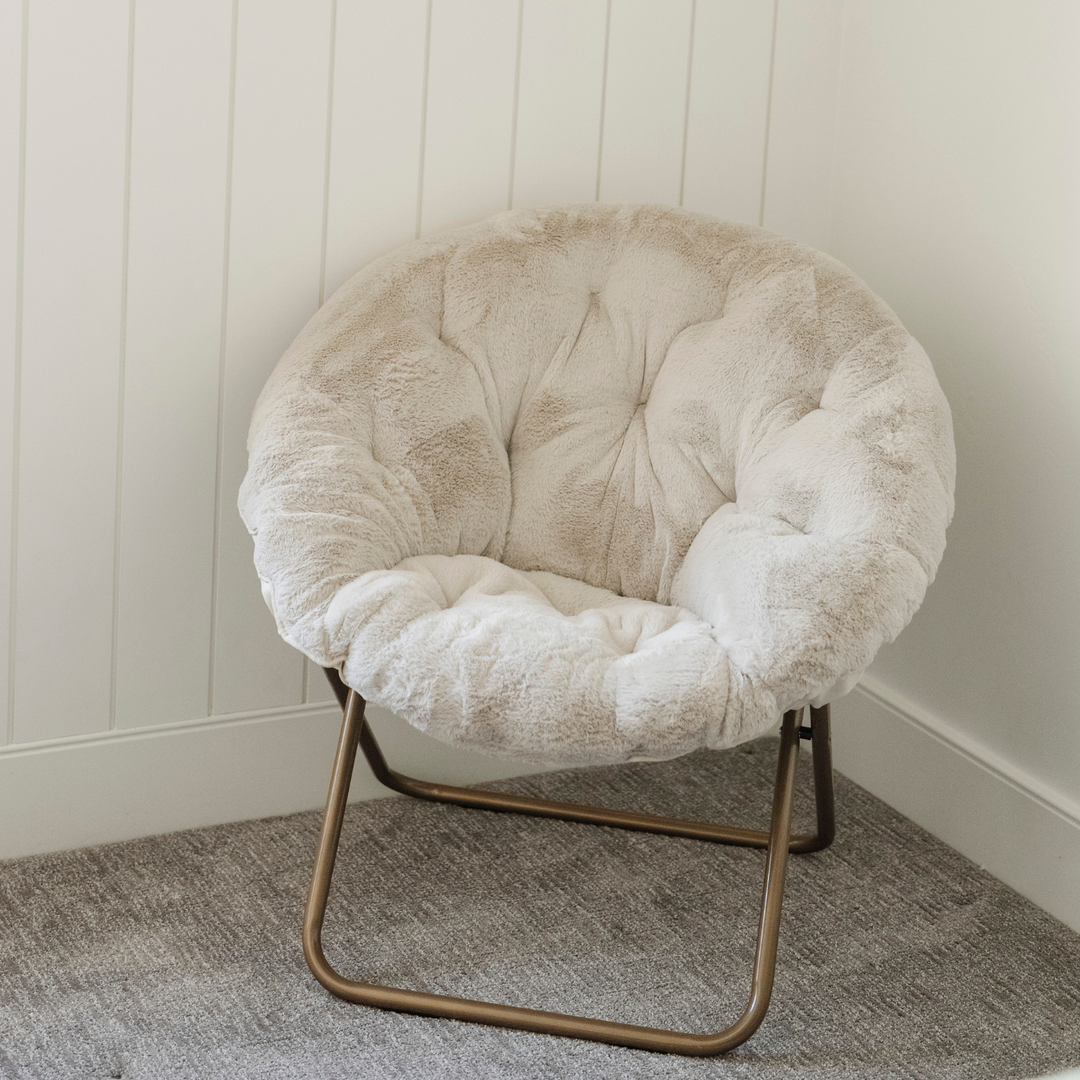 Make any space cozy with the Saranoni Saucer Chair in Buff, a lounge chair for kids.