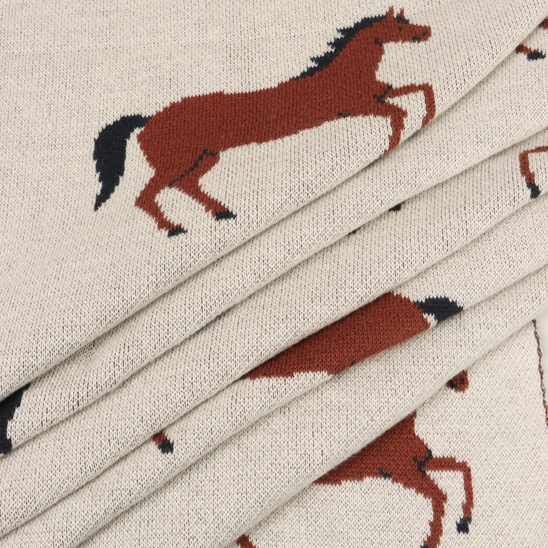 Viverano Organics Organic Cotton Jacquard Knit Baby Blanket in Horse delivers a lightweight and stylish organic baby blanket option.