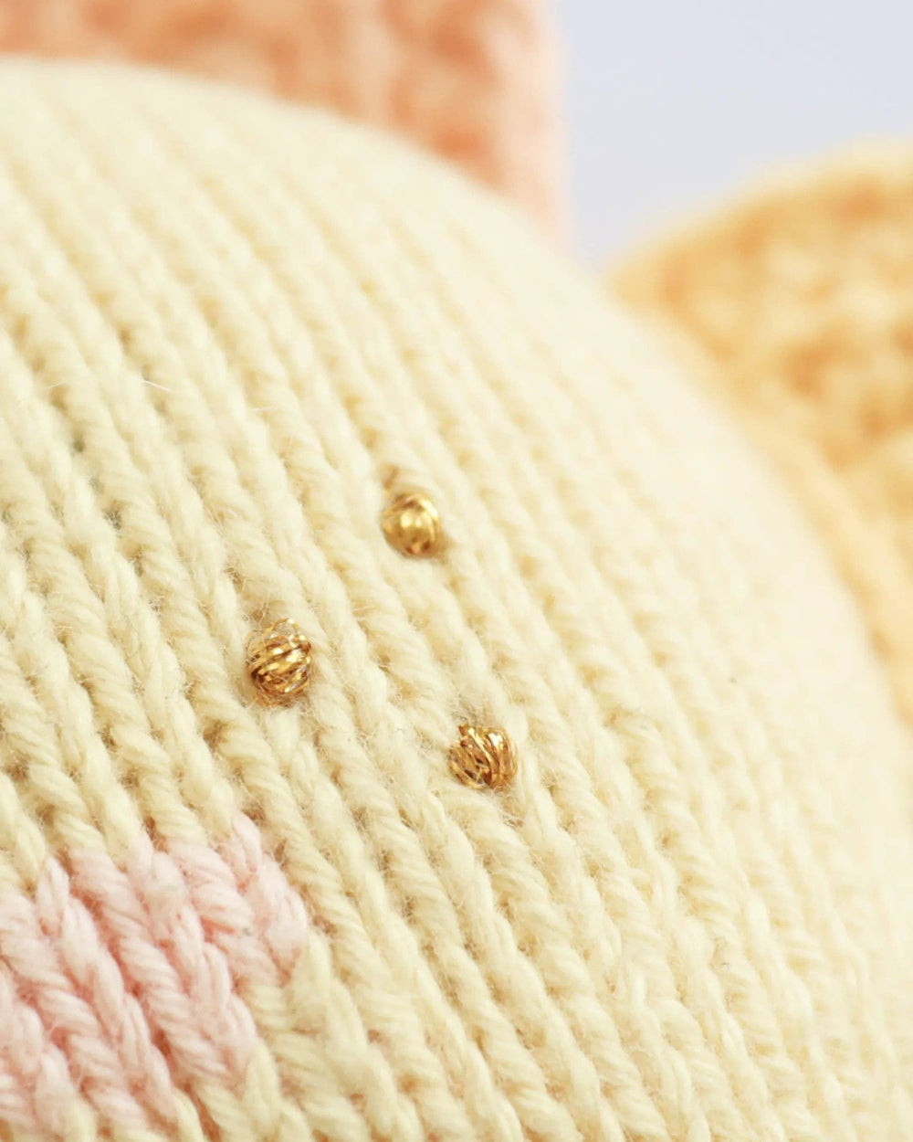 Cuddle + Kind Baby Sunshine, hand-knit sun plush toy for babies