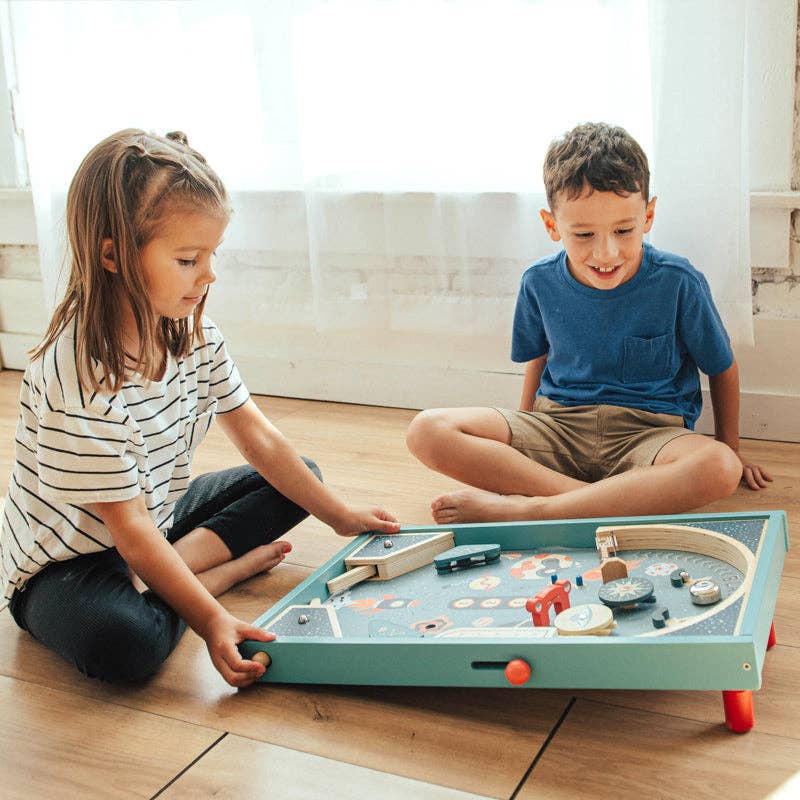Blast Off Pinball by Wonder and Wise showing full playfield with spinning targets bells and scoring tiles for kids
