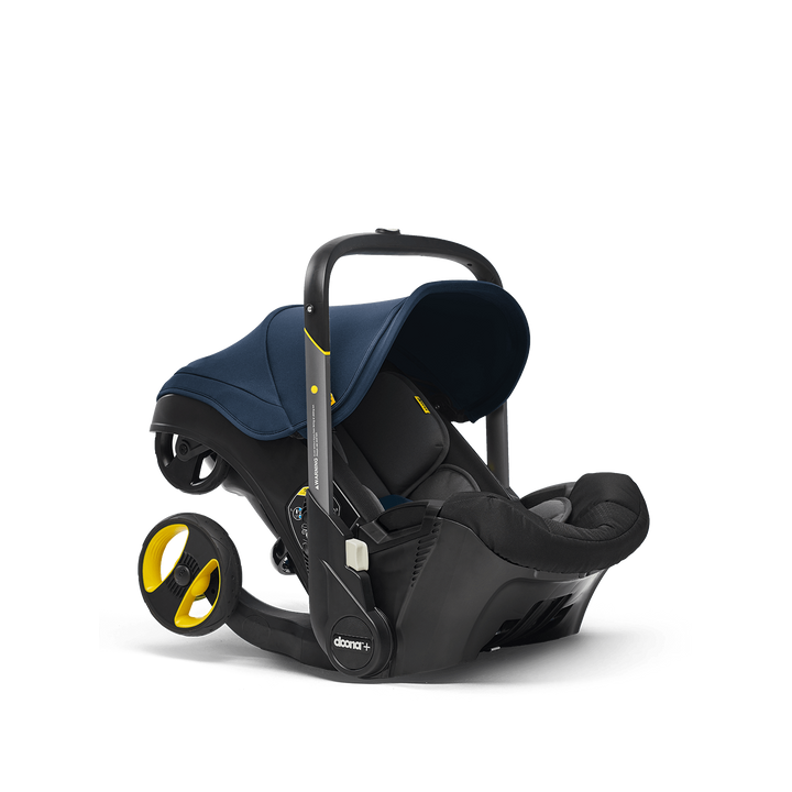 Compact and folded, the Deep Blue Doona Infant Car Seat and Stroller showcases carseat and stroller portability.