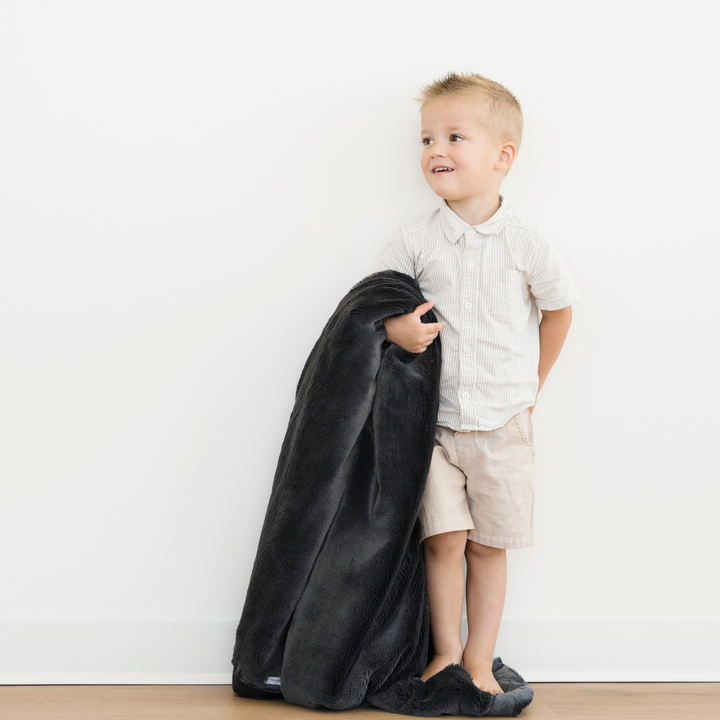 Charcoal sets the tone here with the Saranoni Lush Toddler BlanketÑperfect as a cozy baby boy blanket.