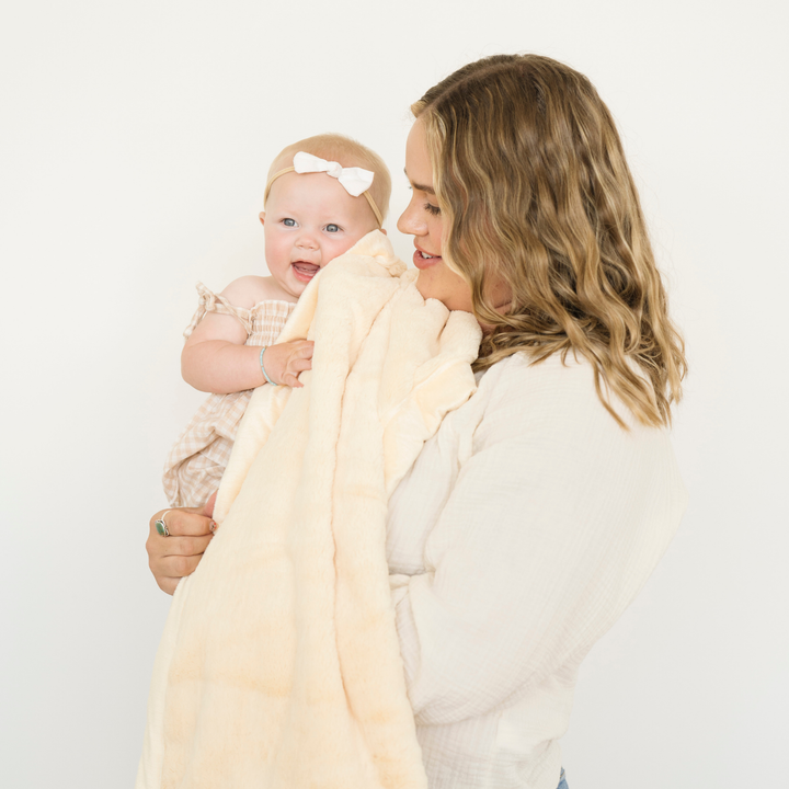 Cuddle your toddler with the Chiffon Saranoni Lush Receiving Blanket, one of the best blankets for toddlers.