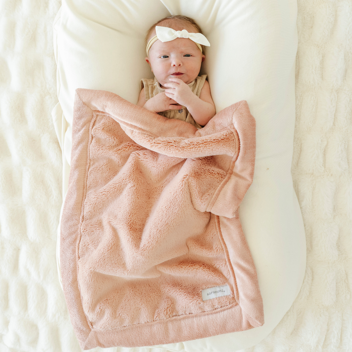 Saranoni Lush Mini Blanket in Blossom feels warm, weightless, and ultra velvety, ideal for soft baby blankets needs.