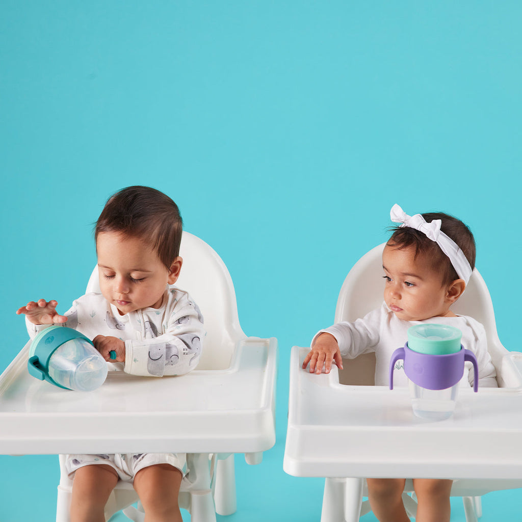 infants in highchairs drinking from bbox 360 training cups