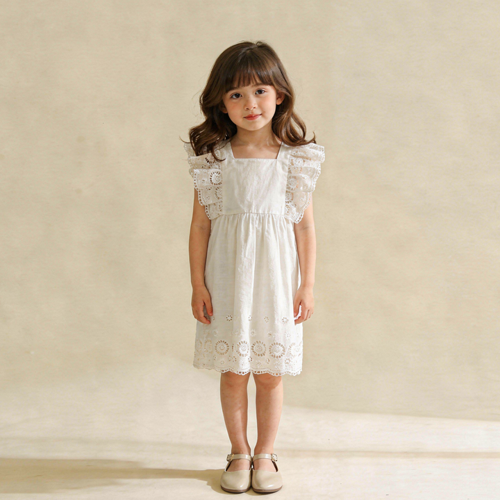 Ivory eyelet organic flutter dress back view - MakeMake Organics A-line breathable baby dress