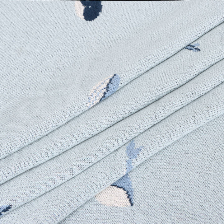Wrap toddlers in Viverano Organics Whales Baby Blanket, a soft toddler blanket perfect for play or quiet rest.