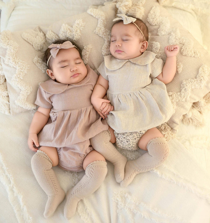 Olive & Cradle French Lace Knee High Socks styled – baby girl in lace knee socks paired with dress outfit