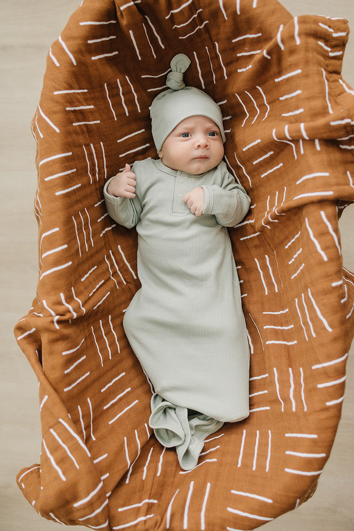 Organic cotton knot gown for newborns, the Sage Organic Cotton Ribbed Knot Gown styled for a hospital photo.