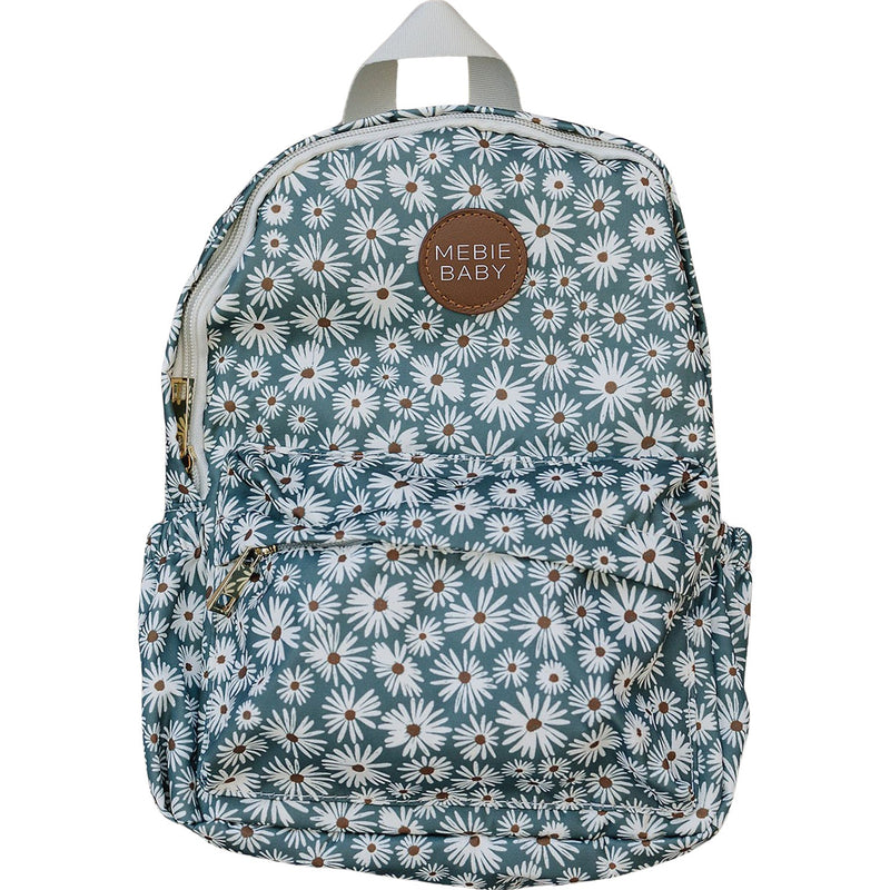 Mebie Baby Green Daisy Mini Backpack shown on a table, a cute mini backpack perfect for kids&