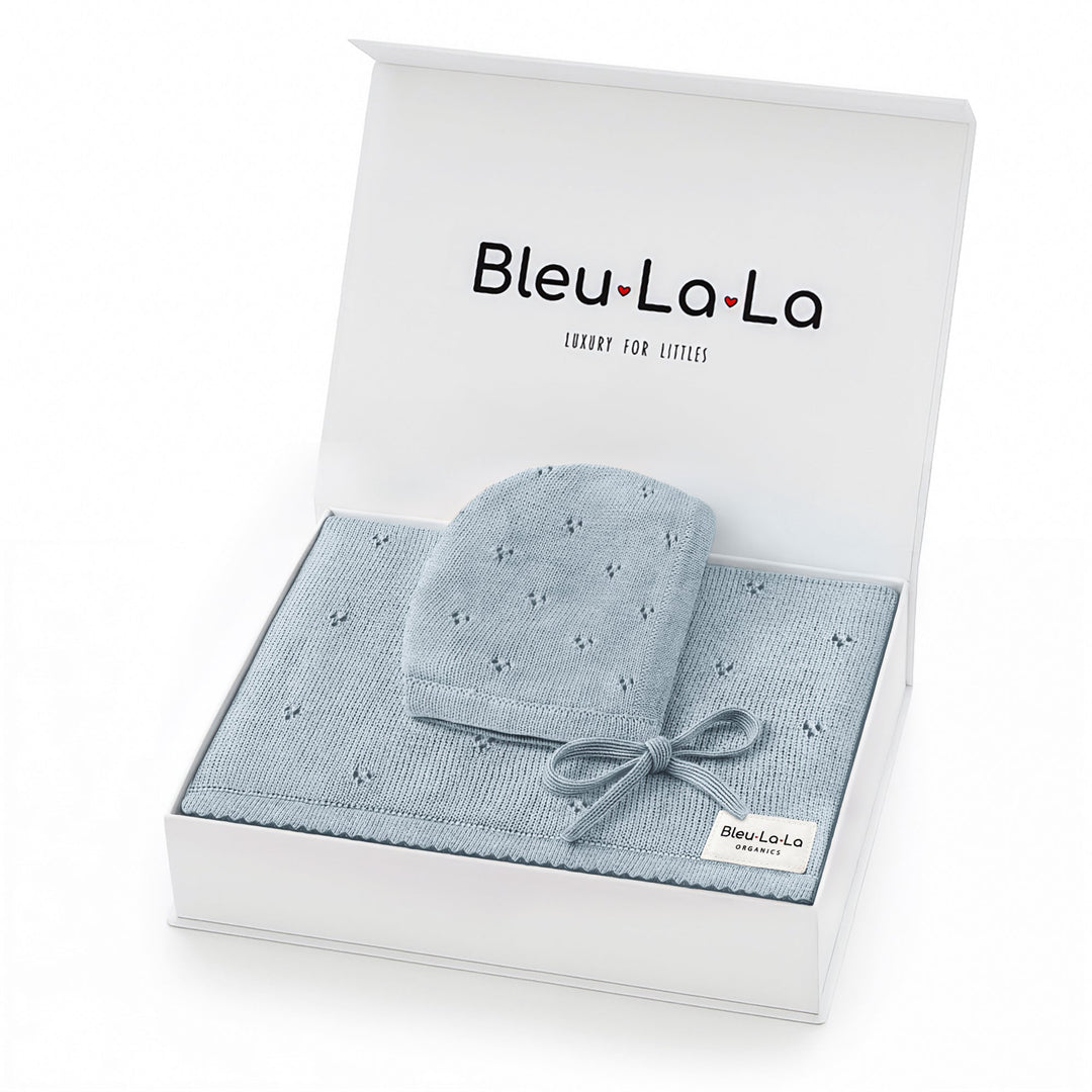 Bleu La La Organic Pointelle Swaddle Blanket + Hat Gift Set in powder blue, boxed presentation showing organic cotton knit and gift-ready packaging.