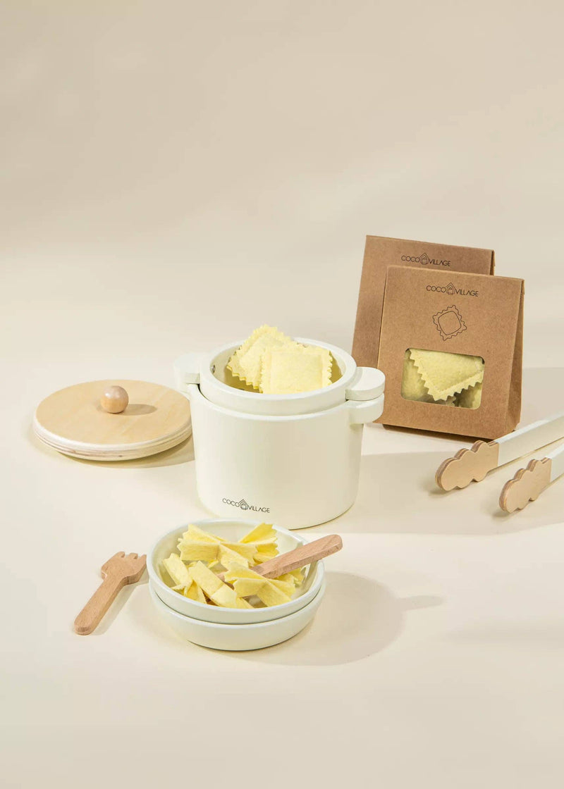 Wholesome fun with the Coco Village Wooden Pasta Playset in Natural wood tones. A charming wooden toy for creative chefs.