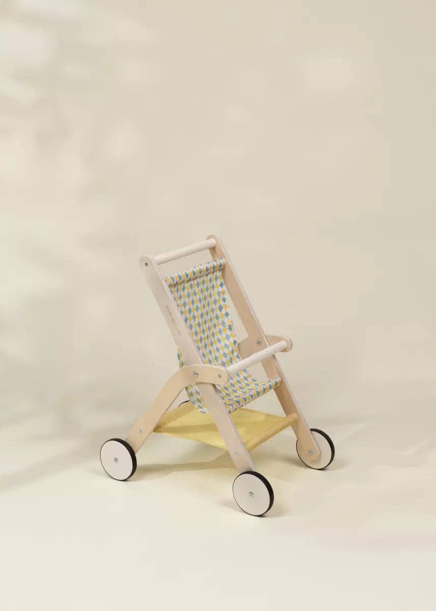 Coco Village Wooden Dolls' Stroller shown at an angle with woven seat back for pretend play