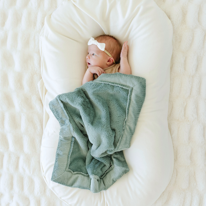 The Saranoni Lush Mini Blanket in Eucalyptus feels timeless and cozy, making it a beloved Best baby blankets choice.