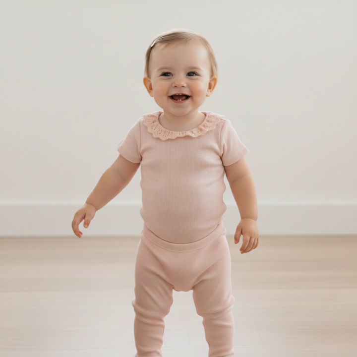 Blush lace collar onesie back view - MakeMake Organics organic cotton baby snap onesie and tights