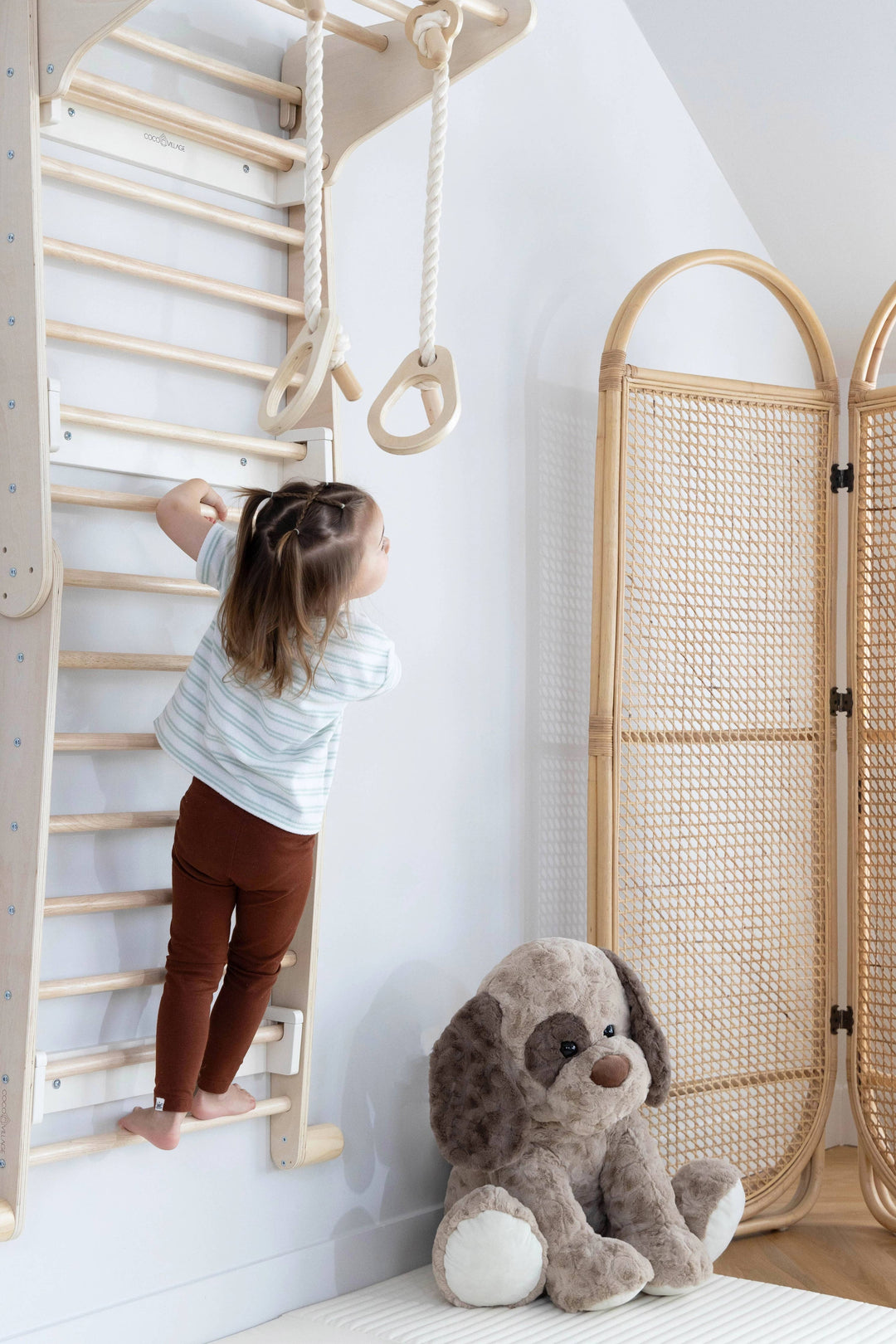 Climb, explore, and balance with the Coco Village Montessori 2-in-1 Triangle & Wall Climber in Natural, a certified Natural playtime solution.