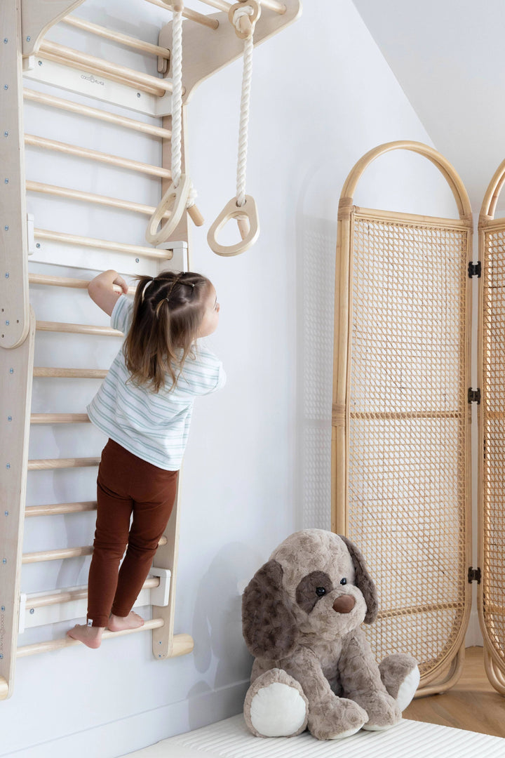Climb, explore, and balance with the Coco Village Montessori 2-in-1 Triangle & Wall Climber in Natural, a certified Natural playtime solution.