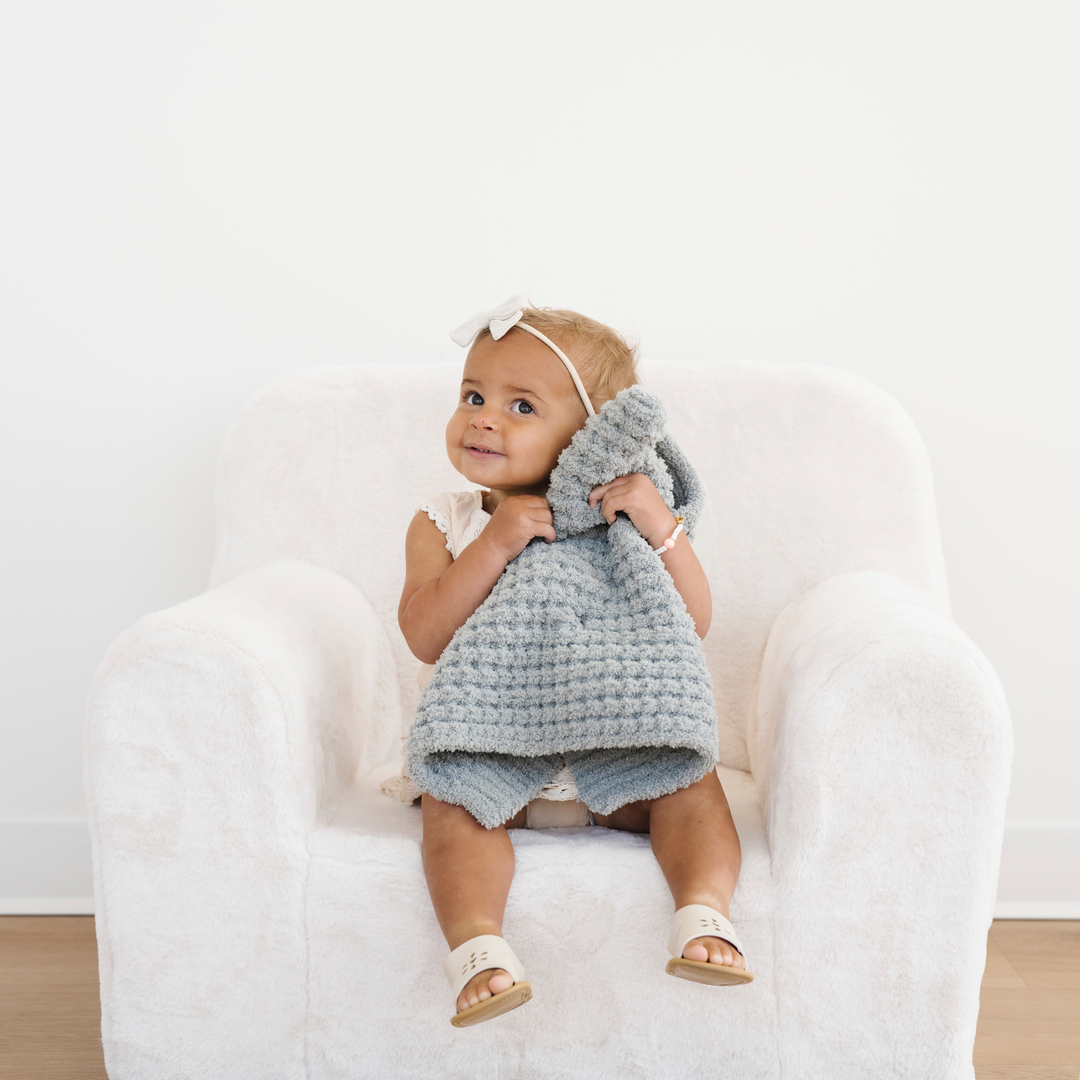 Elm Saranoni Waffle Knit Mini Blanket offers easy modern texture and lightweight snuggle comfort, great for a Baby knit blanket.
