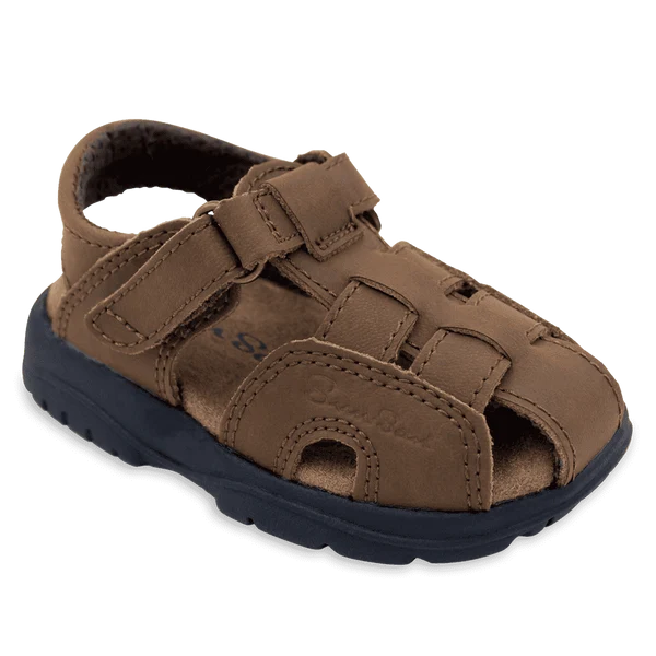 Sun San Shark II Salt Water Sandal in brown leather with closed toe, adjustable velcro strap and navy molded sole