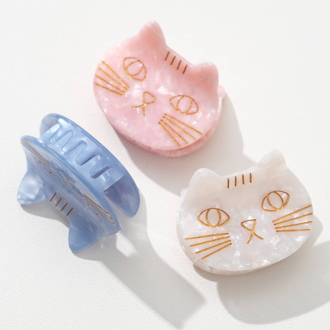 Adorro Saltwater Kitty Cat Claw Clip Small lifestyle image styled in hair showing 2 inch claw clip in Saltwater Blue for half-up hairstyle