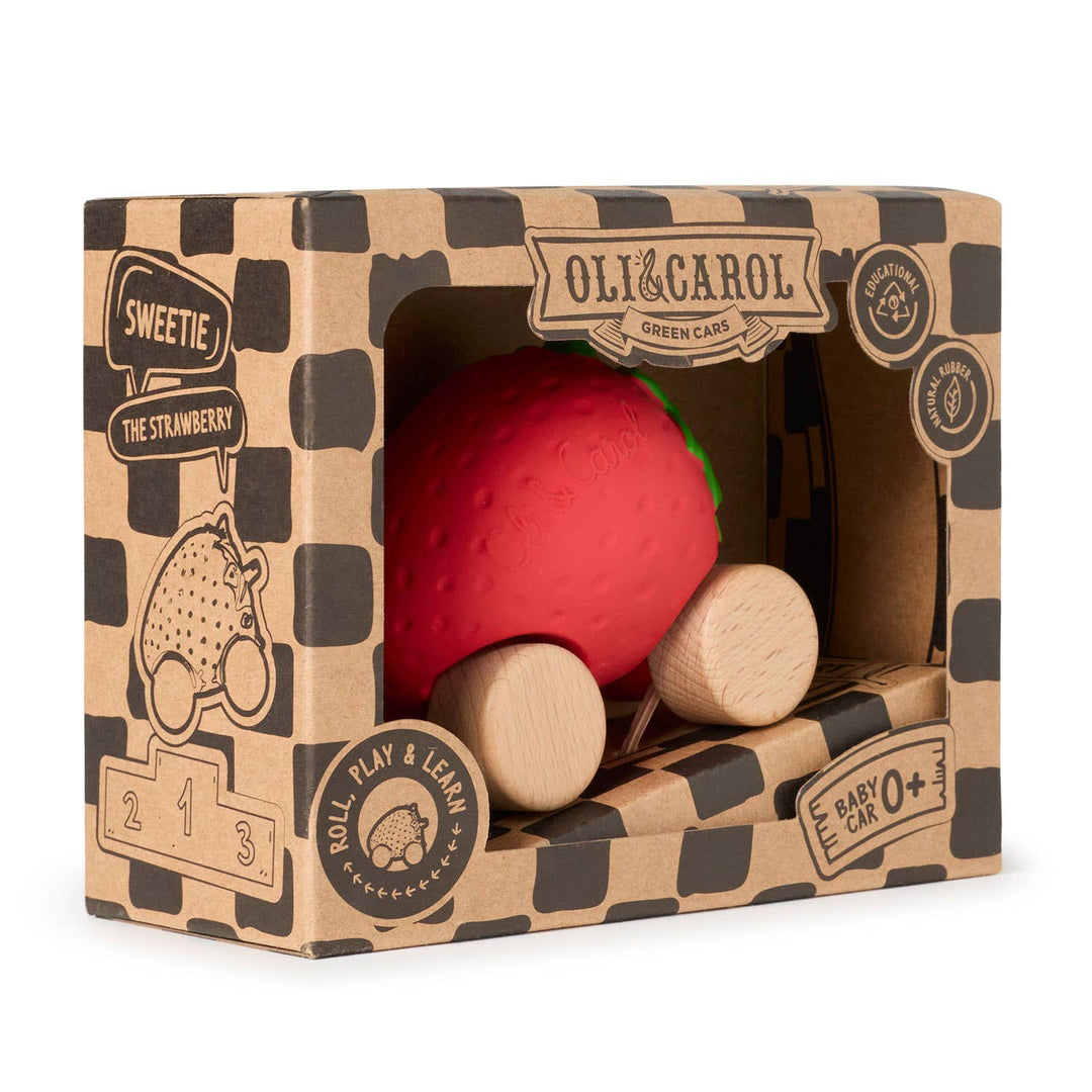 Boxed view of the Oli & Carol Sweetie the Strawberry Baby Car ready for gifting
