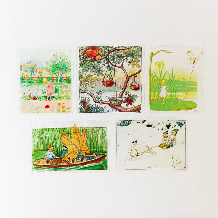 Garden and sailing scenes appear among the collectible prints in the Elsa Beskow Mini Mystery Playsilk