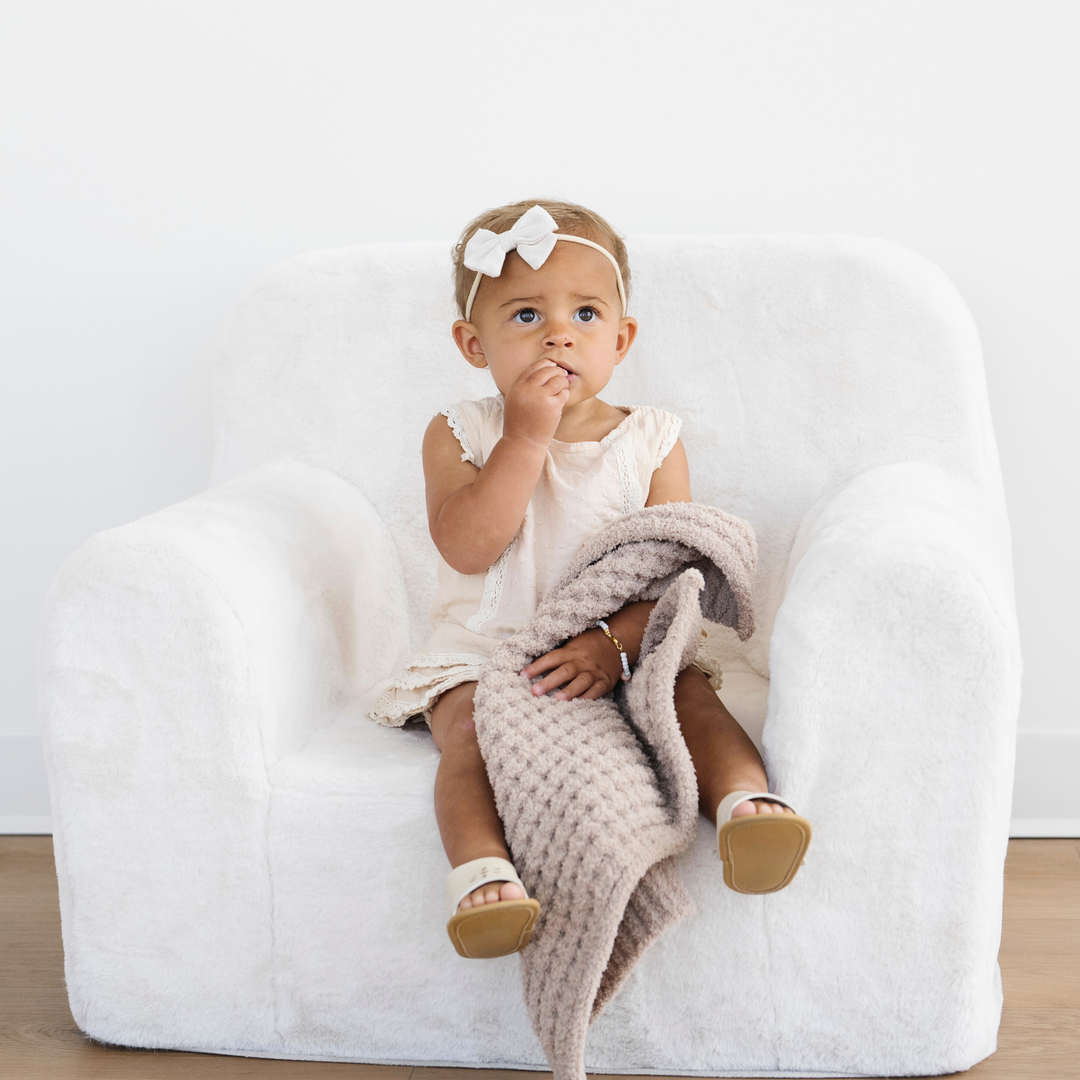 Families love the elevated soft weave of the Saranoni Waffle Knit Mini Blanket in Wheat, perfect as Soft baby blankets.