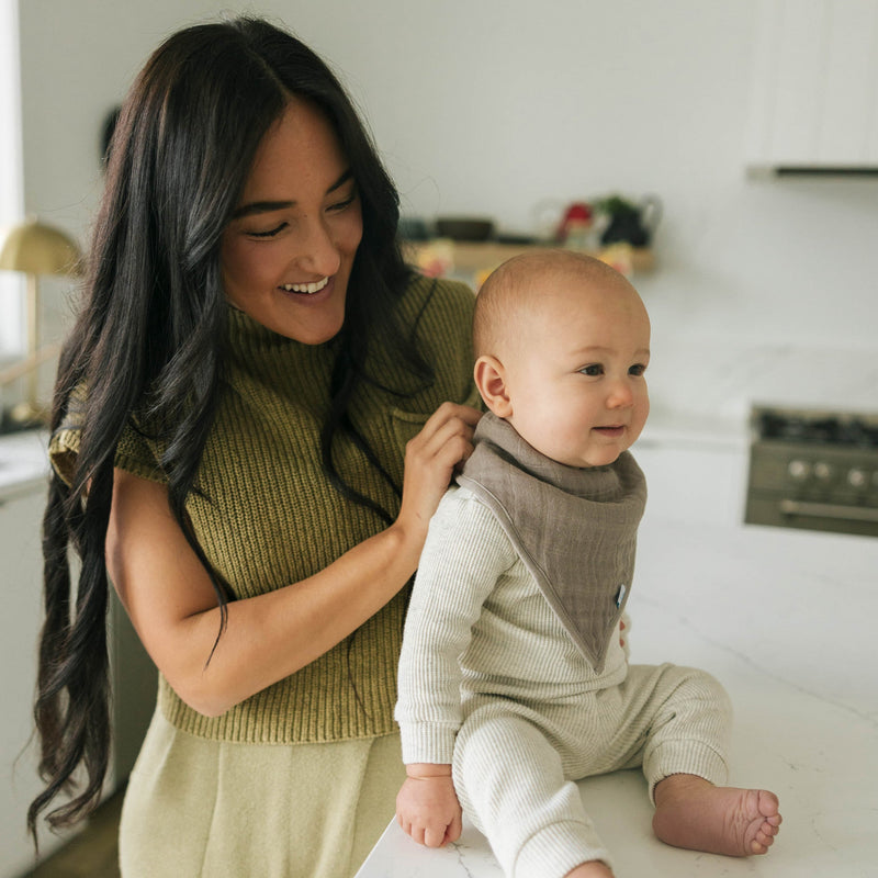 Back view of Little Unicorn Cotton Muslin + Fleece Bandana Bib 4 Pack - Adobe Checker highlighting fleece comfort, premium bib baby.