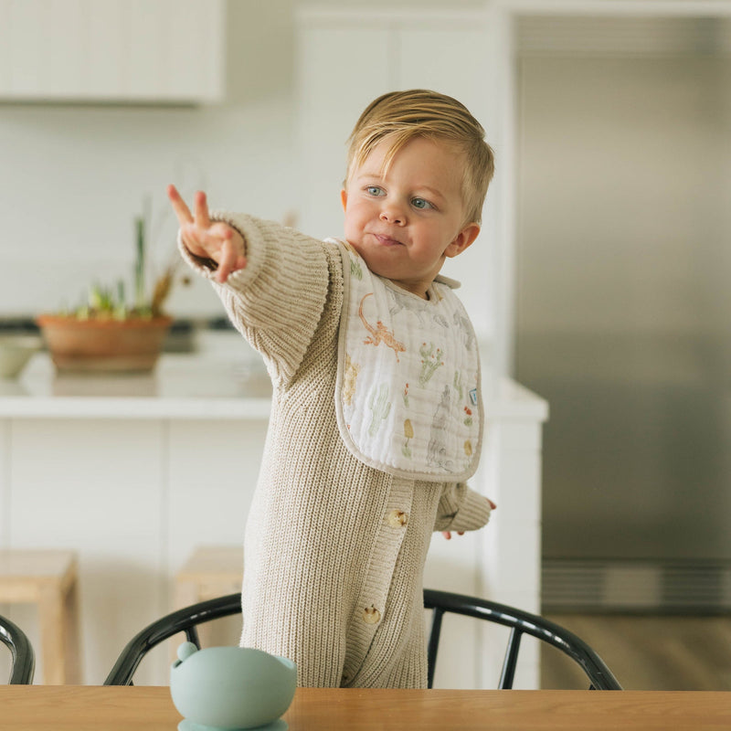 Little Unicorn Cotton Muslin Classic Bib 3 Pack - Adobe Checker styled on neutral background, minimalist bib baby accessory.