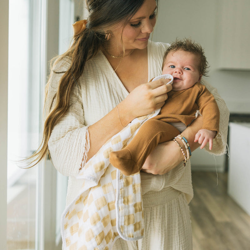 Little Unicorn Cotton Muslin Burp Cloth 2 Pack - Adobe Checker shown in modern neutral tones, among the best burp cloths for babies.