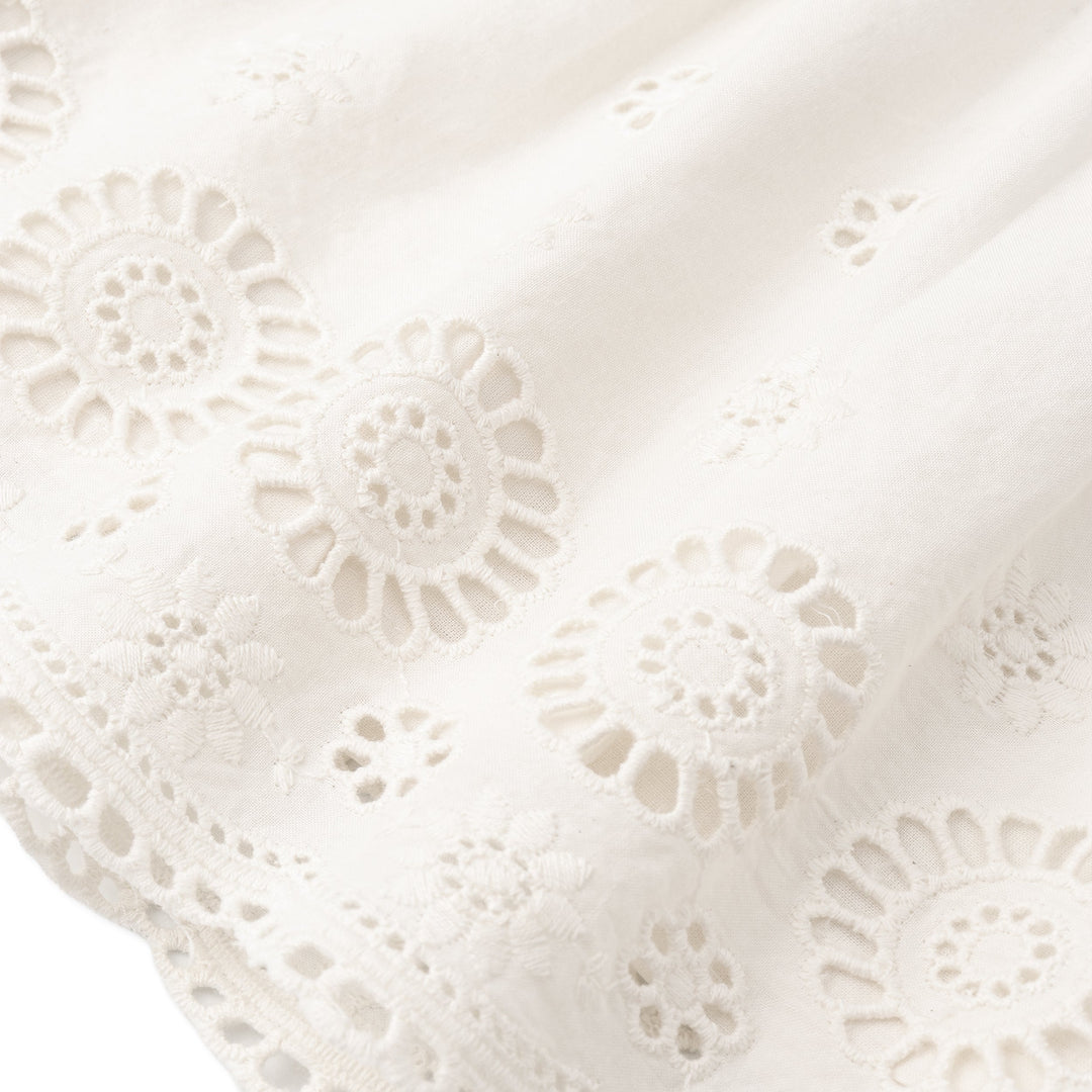 MakeMake Organics Ivory Eyelet Dress detail - intricate open weave organic cotton toddler dress