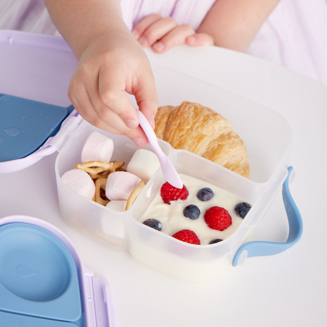 toddler eating from bbox bento box