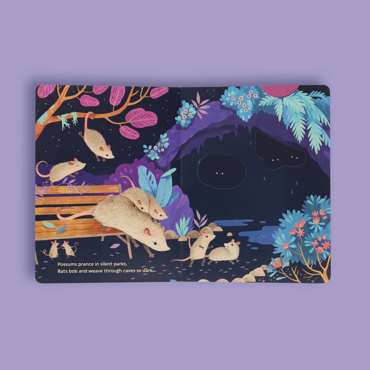 Interior spread of Moonlight Prance showing nighttime forest animal friends